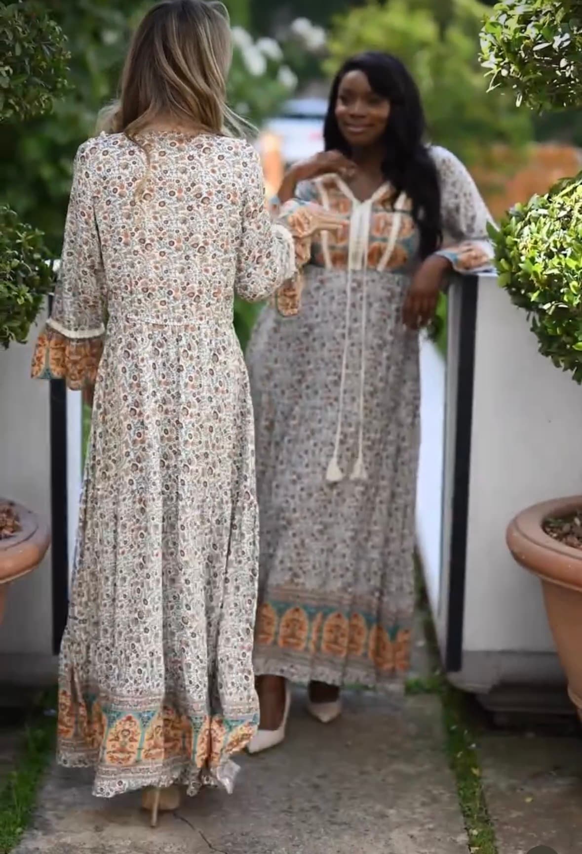 Floral v neck maxi dress with tassel and fringe detailing. So pretty and has a slight fluted sleeve.