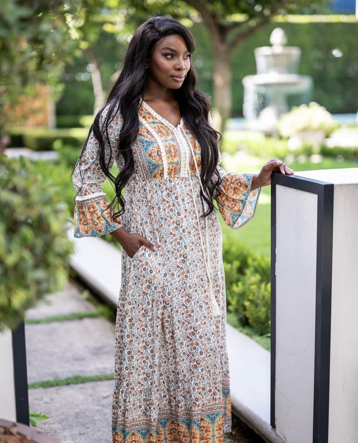 Floral v neck maxi dress with tassel and fringe detailing. So pretty and has a slight fluted sleeve. - Image 3