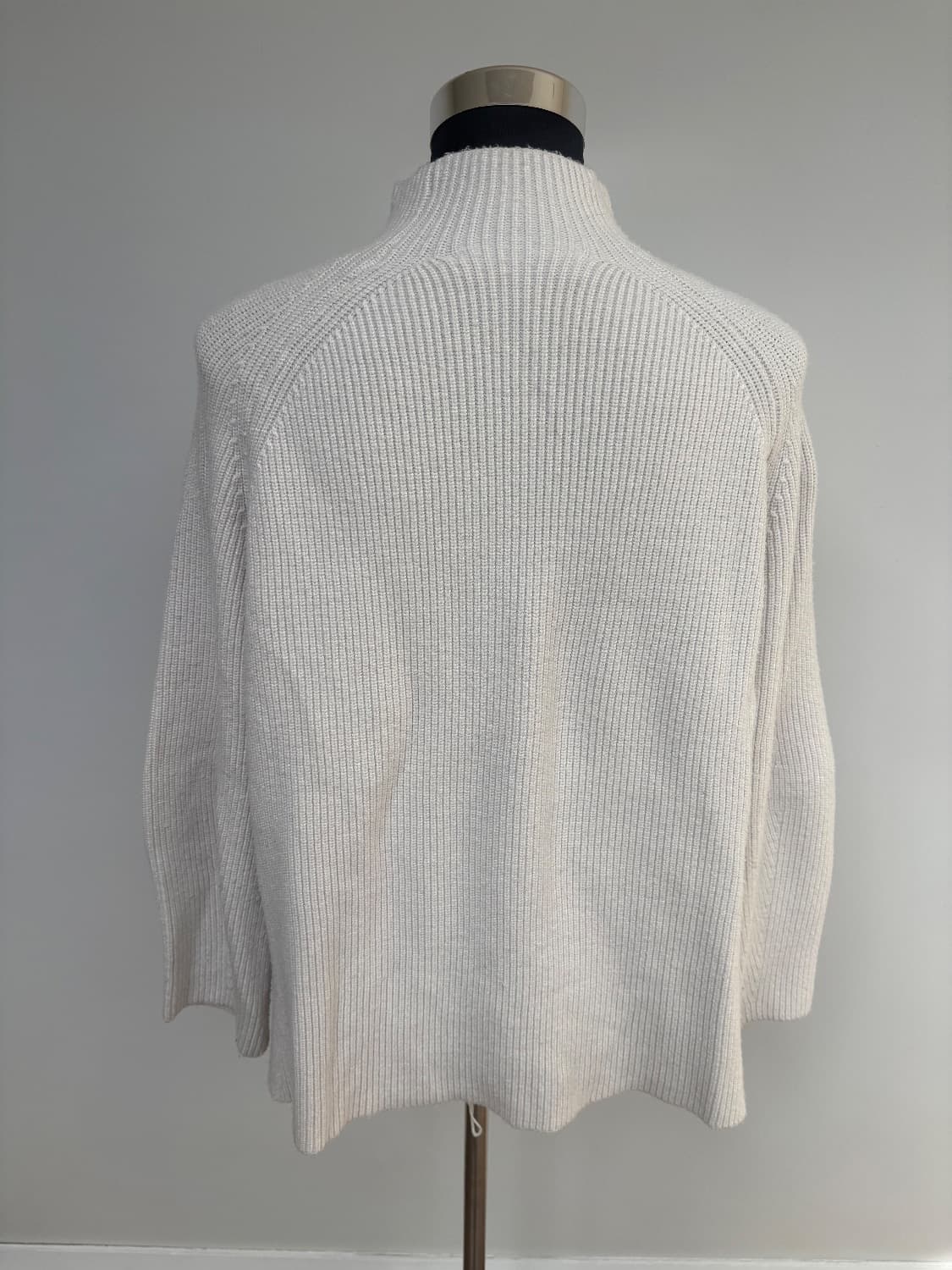 Cream ribbed knit with a mock neck with a small slit hem. Viscose blend . - Image 4