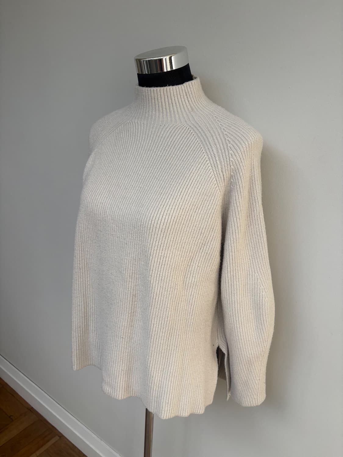 Cream ribbed knit with a mock neck with a small slit hem. Viscose blend . - Image 2
