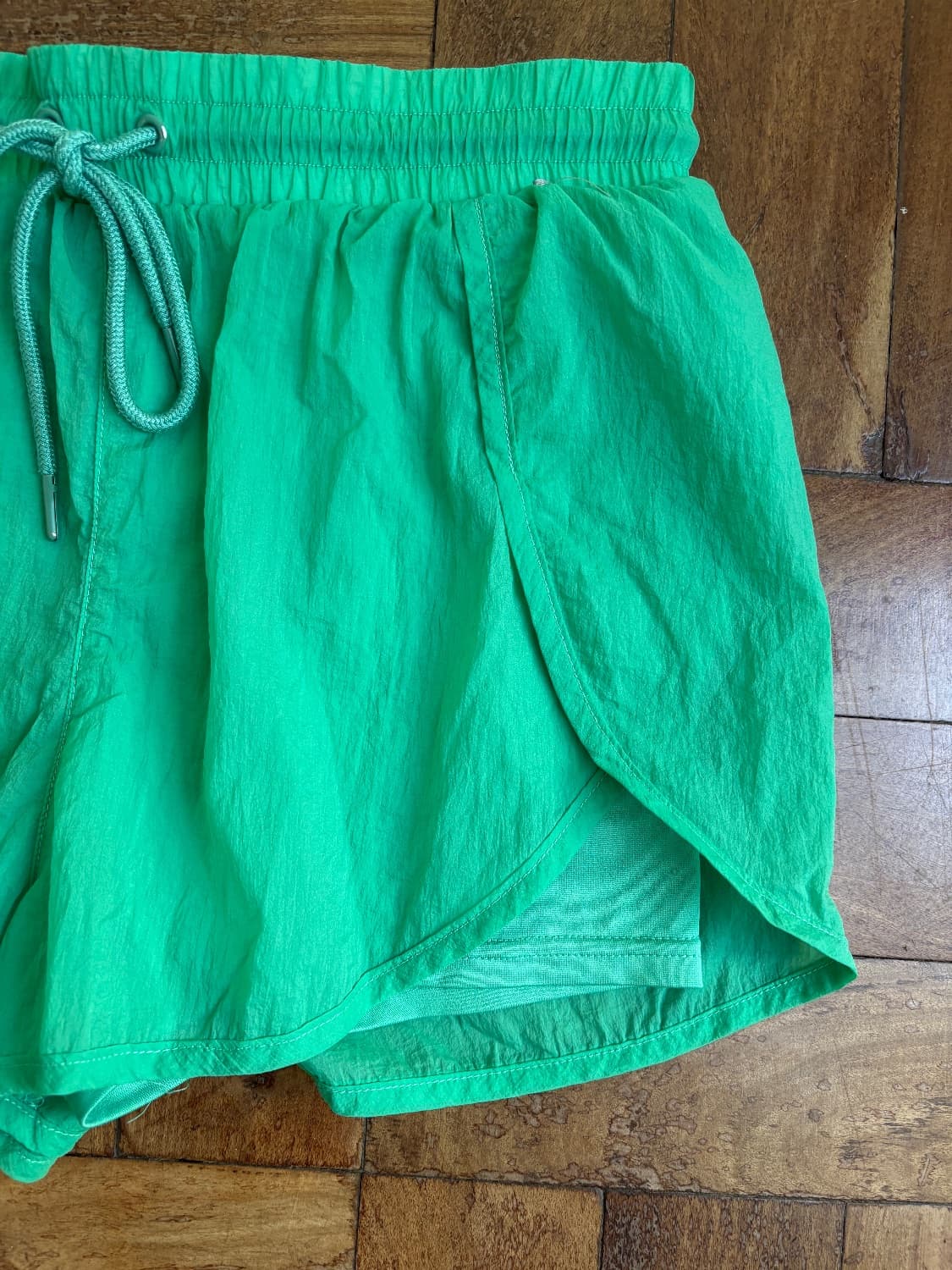 Apple green gym shorts with inner shorts and an Elasticated tie waist.  - Image 2