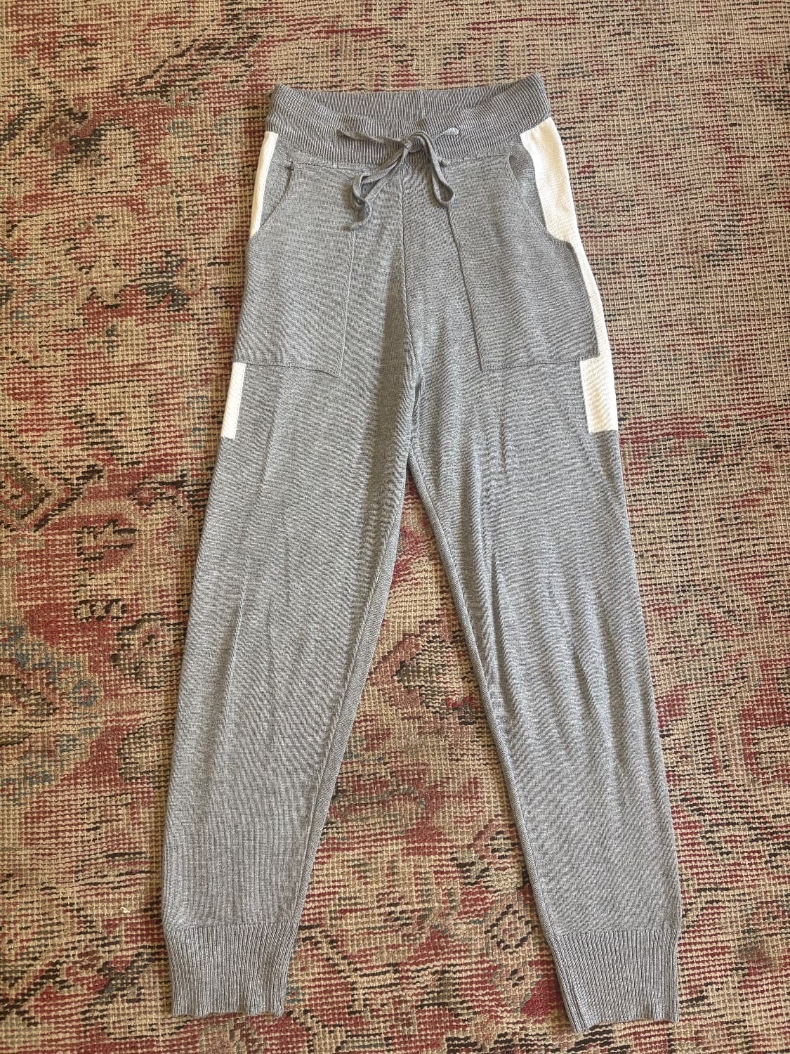 Grey soft joggers with white accents , Elasticated tie waist. 