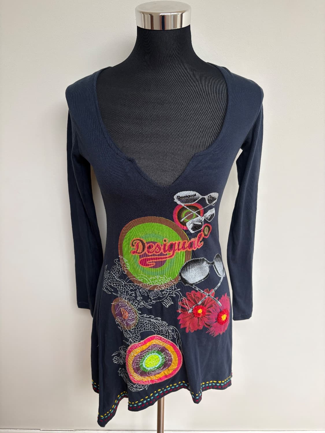 Navy floral notch neck tunic top with bright floral detailing . Asymmetrical hem. 100 per cotton.  - Image 3