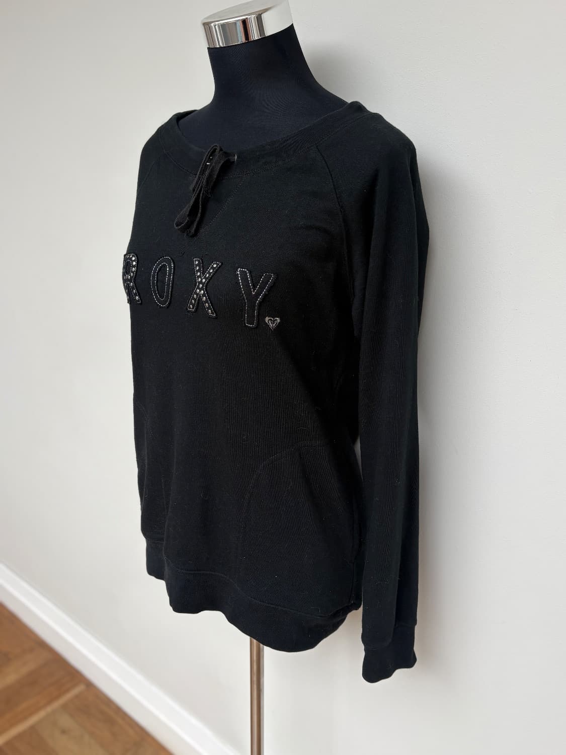 Black Roxy sweater with studded branding. Tie neck detail. Made from poly/ cotton - Image 2