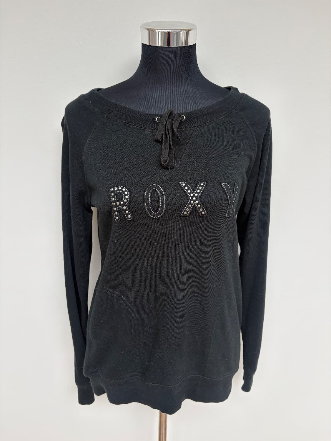 Black Roxy sweater with studded branding. Tie neck detail. Made from poly/ cotton - Roxy - Size M - Preloved Fashion