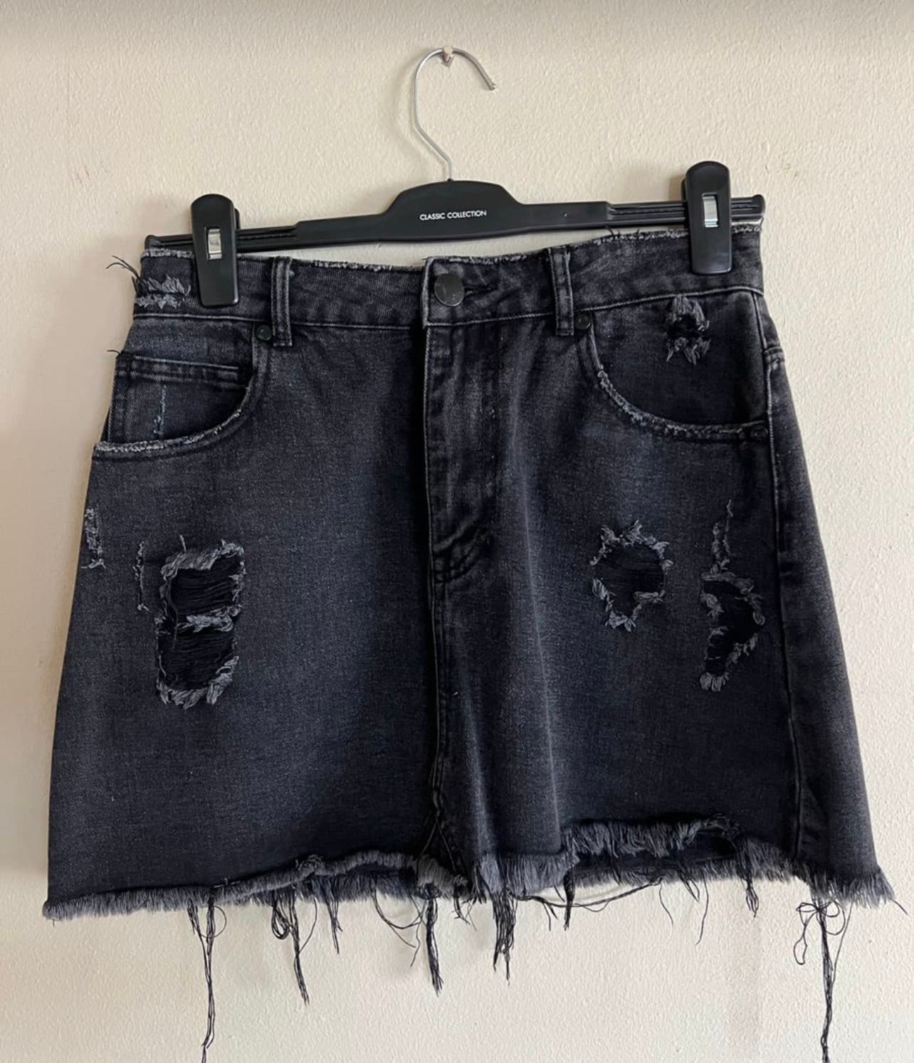 Women’s black denim skirt