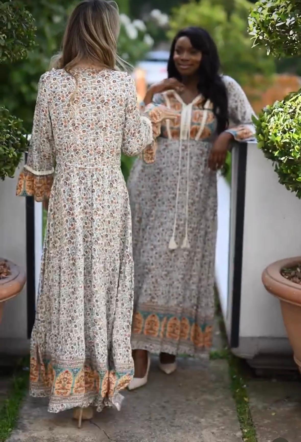 Floral v neck maxi dress with tassel and fringe detailing. So pretty and has a slight fluted sleeve.