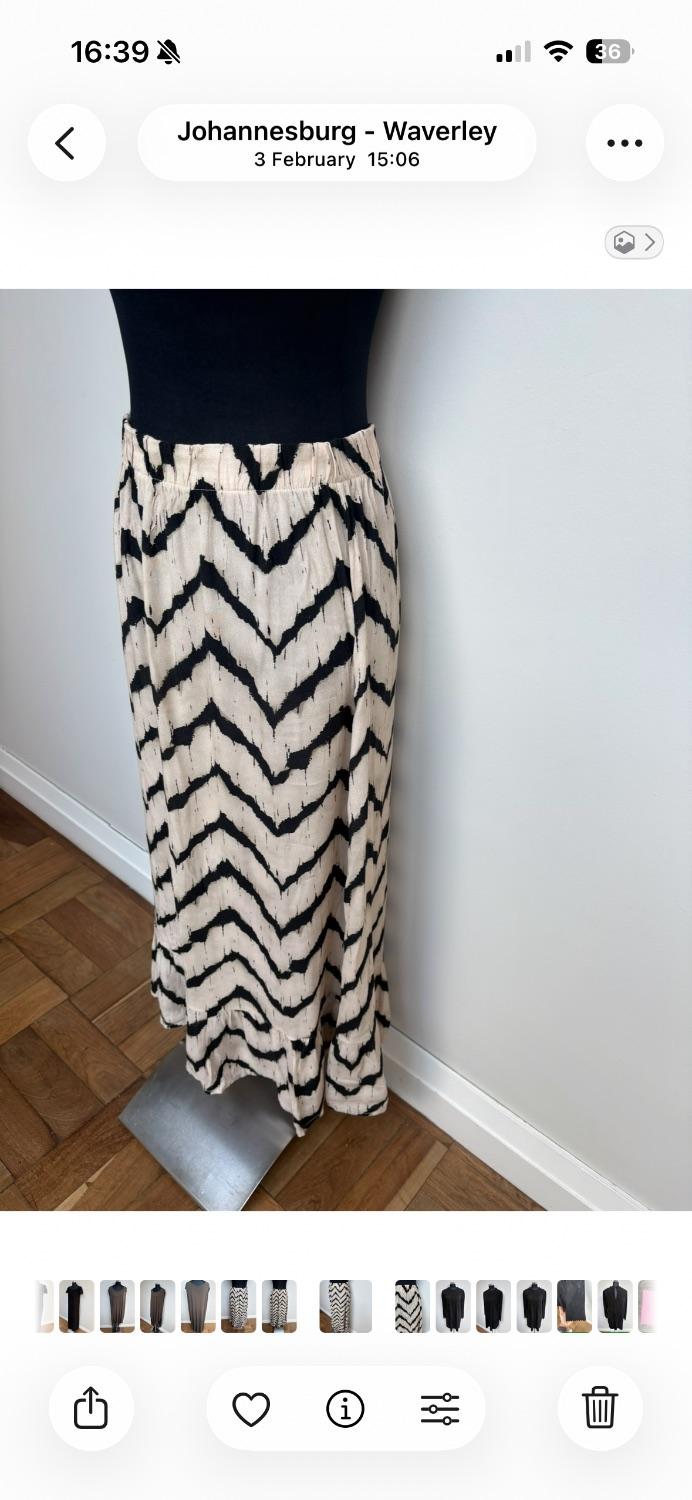 Cream and blk printed maxi skirt with an Elasticated waistband by a s African woman’s brand . - Image 3
