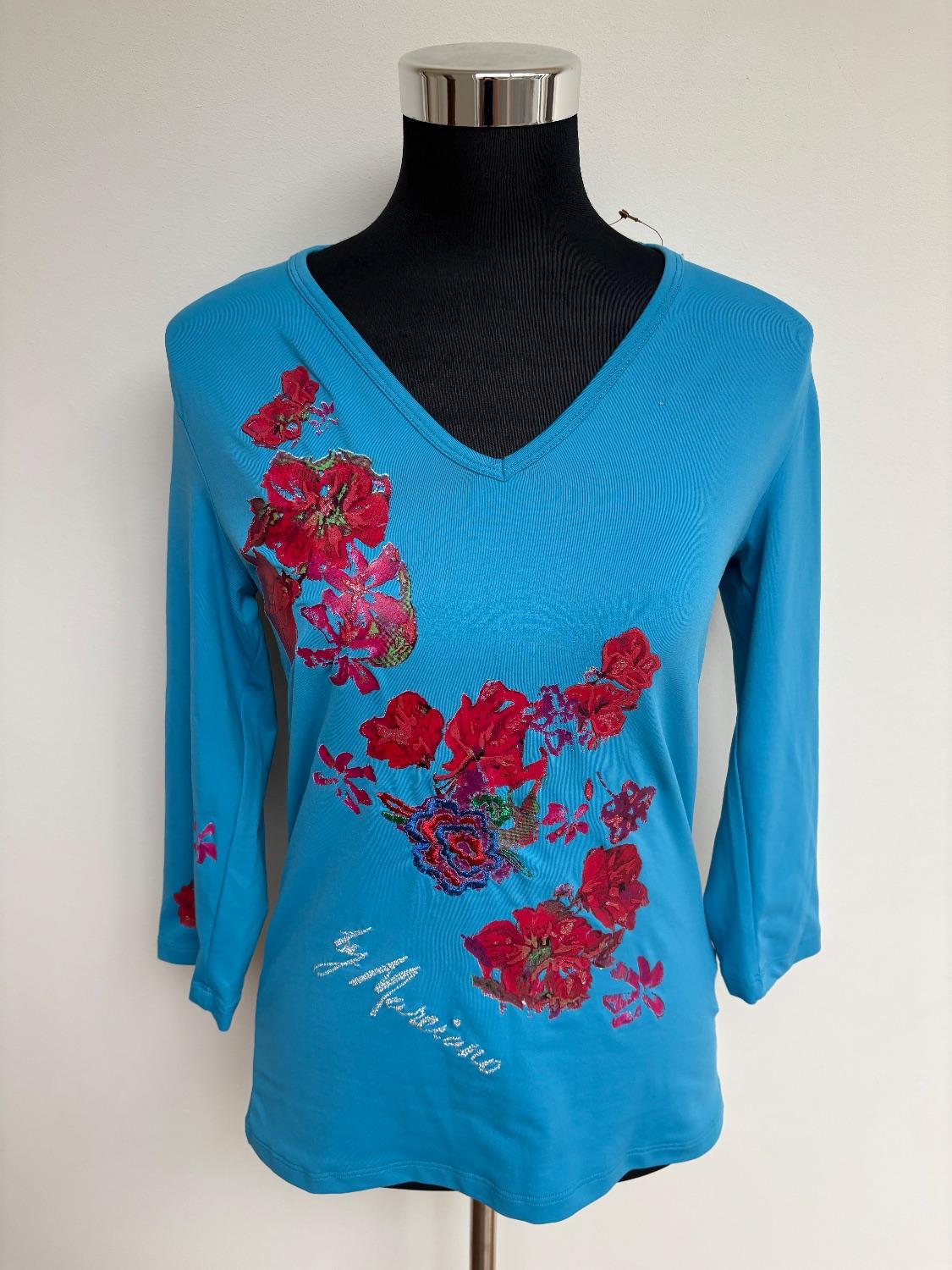 Turquoise 3/4 sleeve guess by Marciano v neck with red rose embroidery. Poly/Elastan