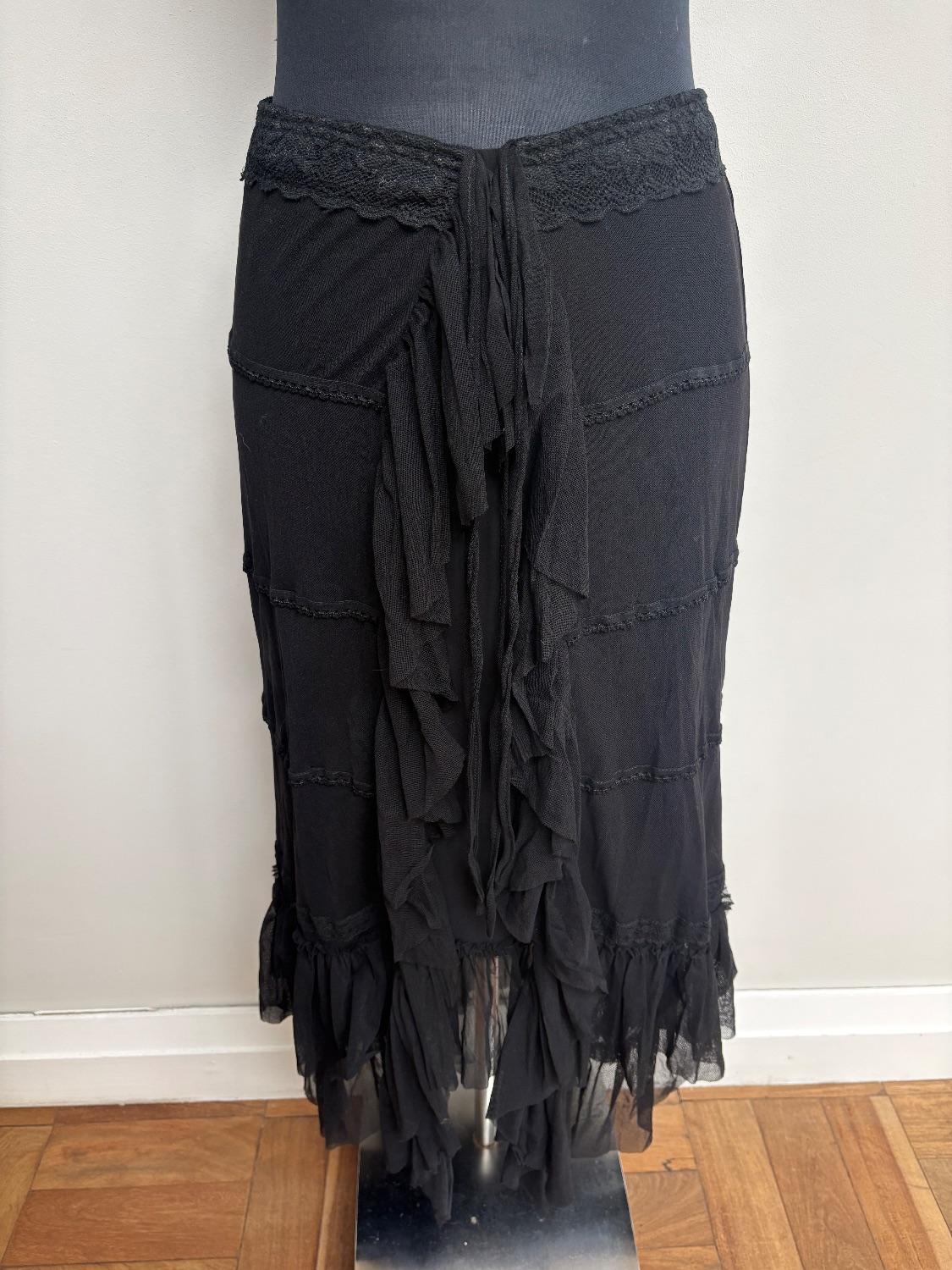 Black Midi skirt with lace and ruffles . Elasticated waist. Size L but will fit a medium - R150