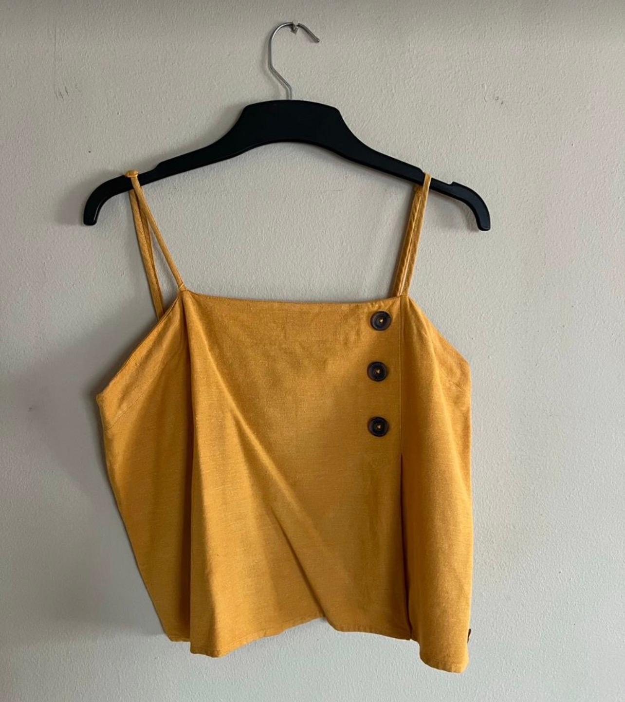 Women’s top. Seam is coming loose.